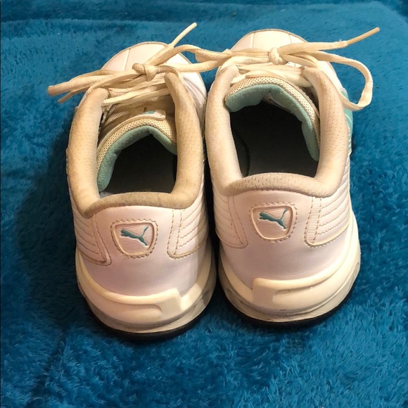 White and teal Puma tennis shoes. - Picture 3 of 5